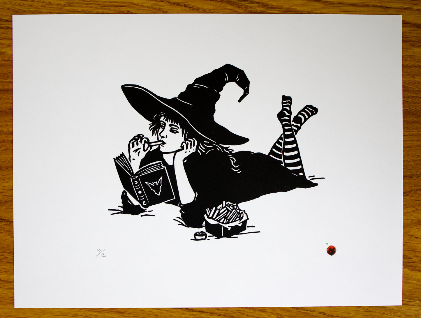 Witch Reading and Eating Fries