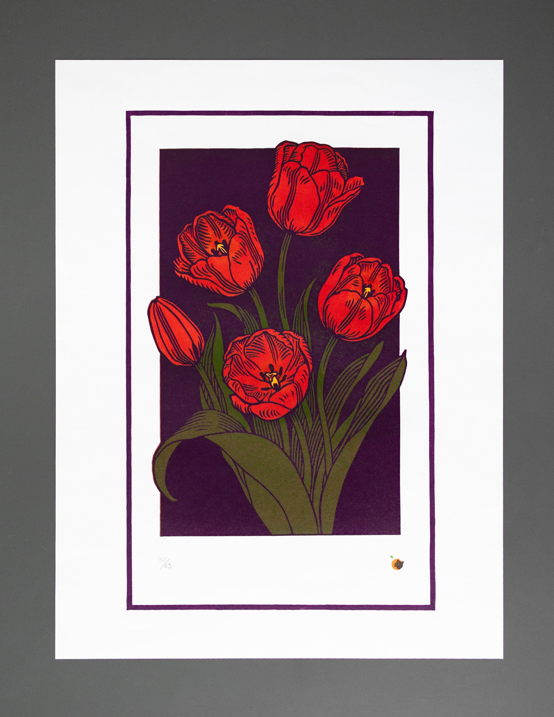 Red tulips print on a purple background with a white border